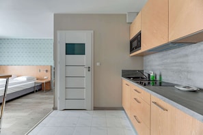 Fridge, microwave, stovetop, coffee/tea maker