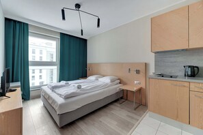 Iron/ironing board, travel crib, WiFi, bed sheets