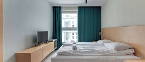 Fer et planche à repasser, lit parapluie, Wi-Fi, draps fournis