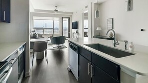 Fridge, dining tables - Landing | Modern 1BD, Gym, Game Room (Houston)