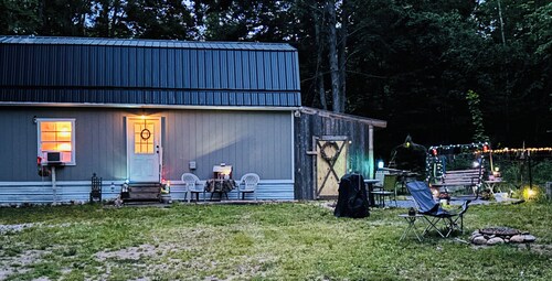 Enchanting cabin with AC in charming Frederic.  1 bedroom studio in the woods