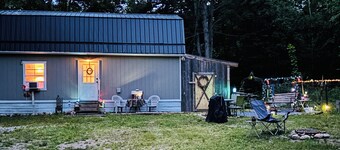 Enchanting cabin with AC in charming Frederic.  1 bedroom studio in the woods