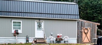 Enchanting cabin with AC in charming Frederic.  1 bedroom studio in the woods