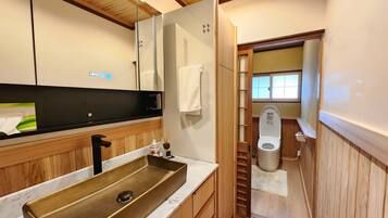 Hair dryer, towels, soap, toilet paper