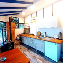 Economy Room, Garden View | Private kitchen | Mini-fridge, microwave, stovetop, cookware/dishes/utensils