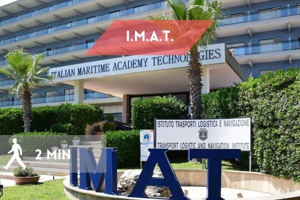 The Italian Maritime Academy Technologies building with a sign for the Transport Logistic and Navigation Institute. - [Panoramic and 90 meters from the sea] (Castel Volturno)