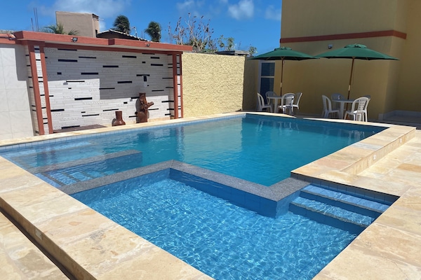 Outdoor pool, open 8:00 AM to 9:00 PM, pool umbrellas