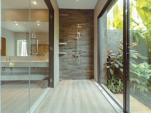 Bidet, towels, soap, toilet paper