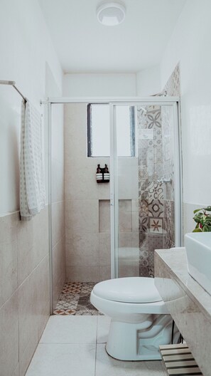 Shower, hair dryer, towels, soap