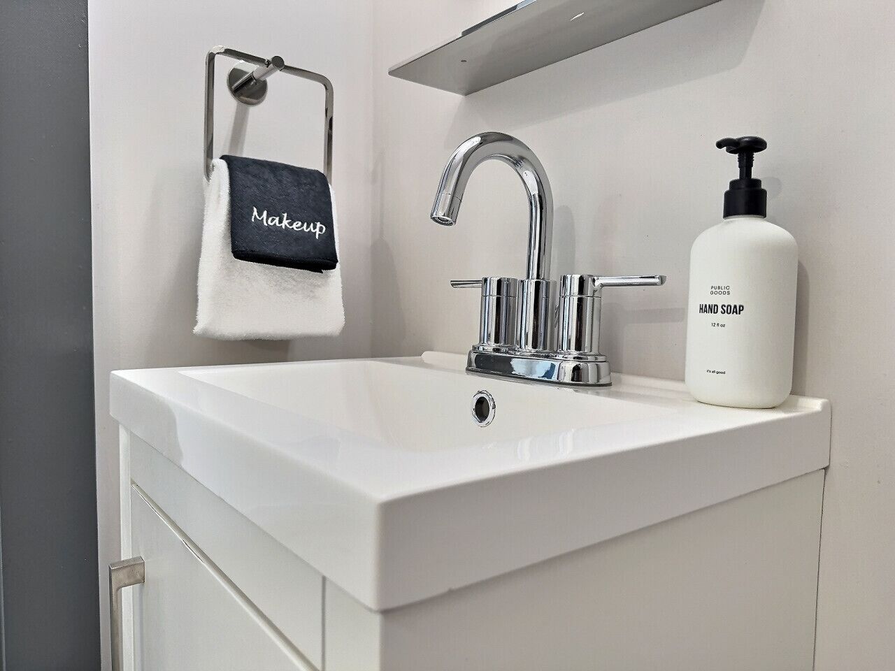 Make use of a clean and modern sink for your convenience in a fully furnished apartment.