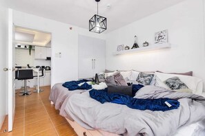 2 chambres, fer et planche à repasser, Wi-Fi, draps fournis