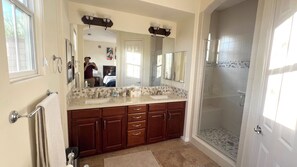 Shower, hair dryer, towels, soap