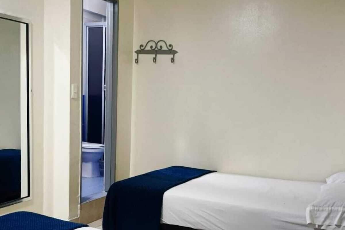Desk, blackout drapes, iron/ironing board (on request), WiFi (free)
