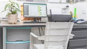 A modern office with a desk, computer, printer, and storage drawers. - Hotel Alcazar Medellin (Medellín)