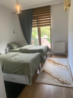 2 chambres, fer et planche à repasser, accès au Wi-Fi (inclus)