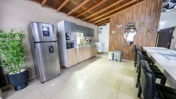 Fridge, microwave, stovetop, coffee/tea maker