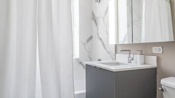 Hair dryer, towels, soap, toilet paper