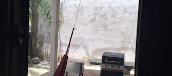 Charming 2-bedroom house with AC 10 mins walking away from the beach in Tela