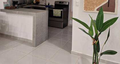 Charming 2-bedroom house with AC 10 mins walking away from the beach in Tela