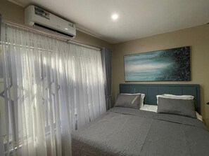 2 chambres, fer et planche à repasser, Wi-Fi, draps fournis