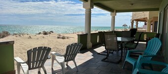4 or 5 Bdrm Beachfront NEW Listing. Spacious, WiFi, AC, sleeps up to 14 in beds