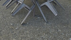 A table and chairs set outside a building with a tiled roof, a door, and a window. - 2-bedroom self-contained apartment sleeps 4 to 6, 20min from beach (Curzon)