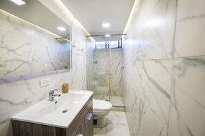 Shower, hair dryer, towels, soap