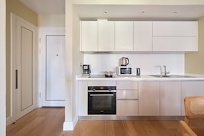Classic Apartment, 1 Bedroom, Patio | Desk, laptop workspace, blackout drapes, soundproofing