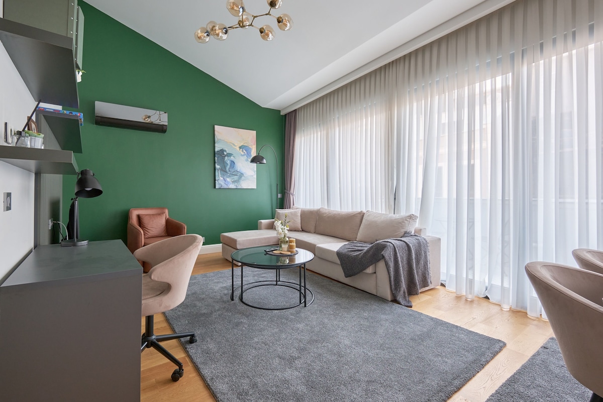 Family Apartment, Patio, City View | Living area | 55-inch flat-screen TV with satellite channels, TV, Netflix