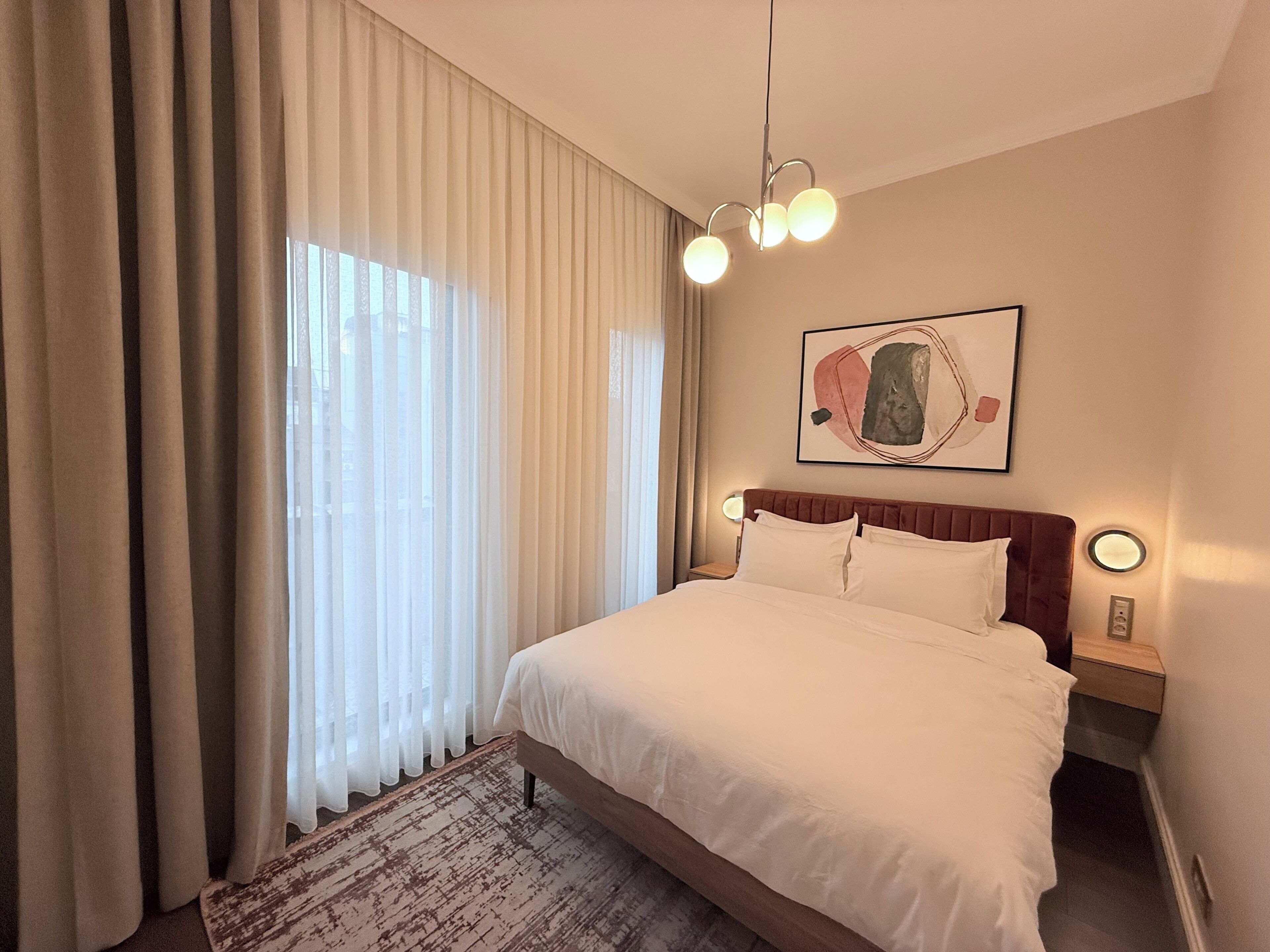 Deluxe Apartment, 1 Bedroom, Balcony, City View | Premium bedding, individually decorated, individually furnished, desk