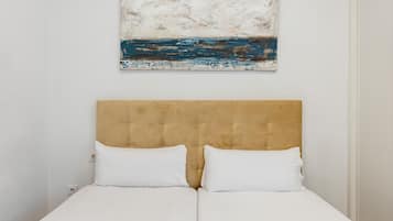 1 dormitorio, tabla de planchar con plancha, Internet y ropa de cama