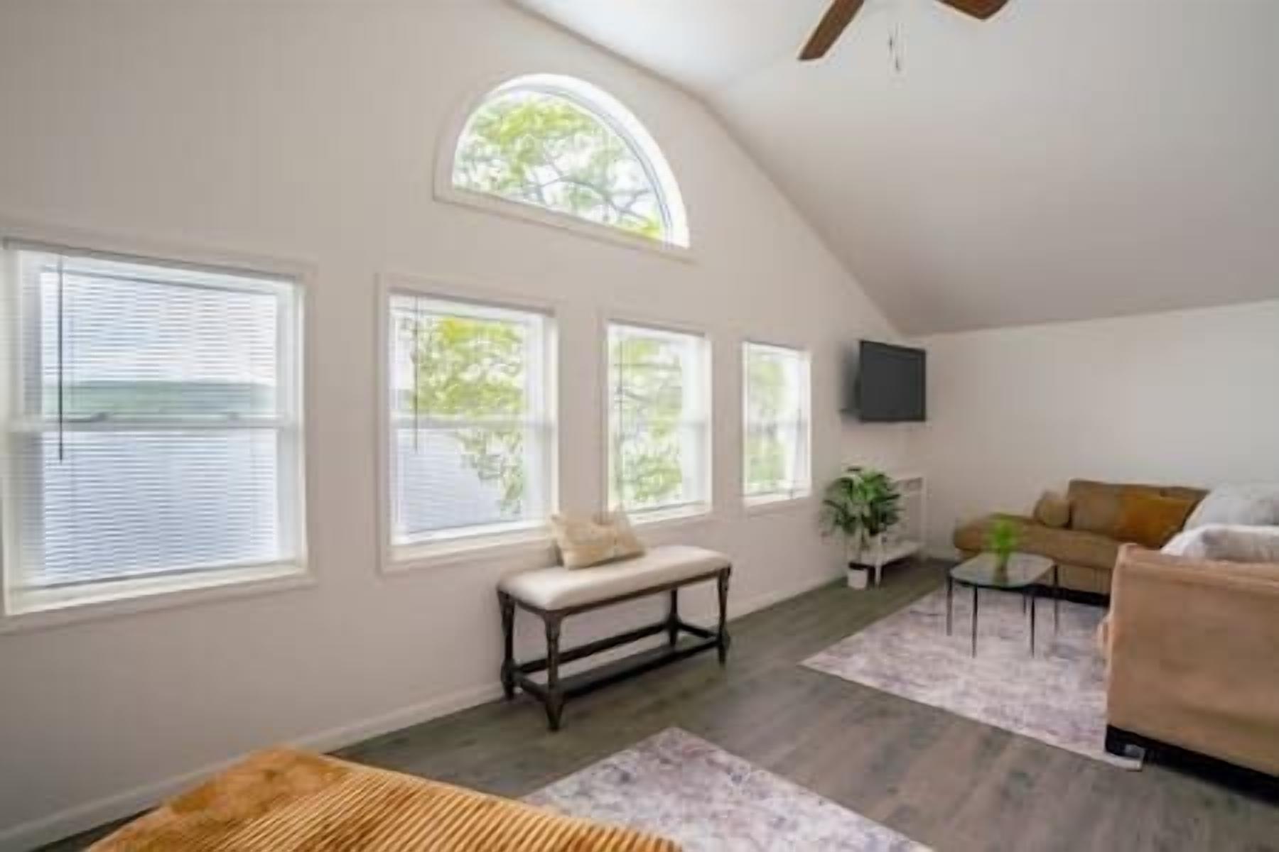 Smart TV, fireplace, books, offices