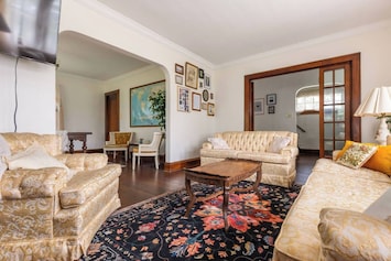 The light-filled living room can accommodate all guests and is a great place to meet up for a movie or game!