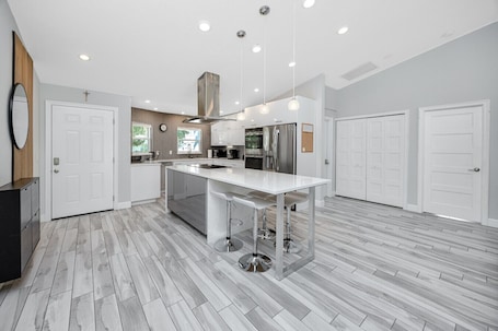 Fridge, microwave, oven, ice maker. NEW! Palm Harbor Hideaway | Gorgeous Home with Pool & Tropical Oasis