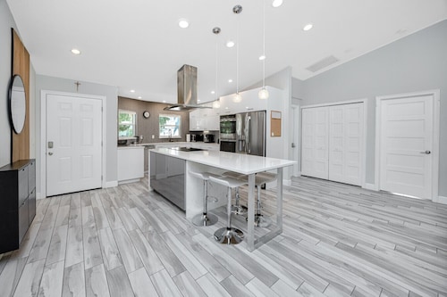 Palm Harbor Hideaway | Gorgeous Home w/ Heated Pool, Hot Tub & Tropical Oasis