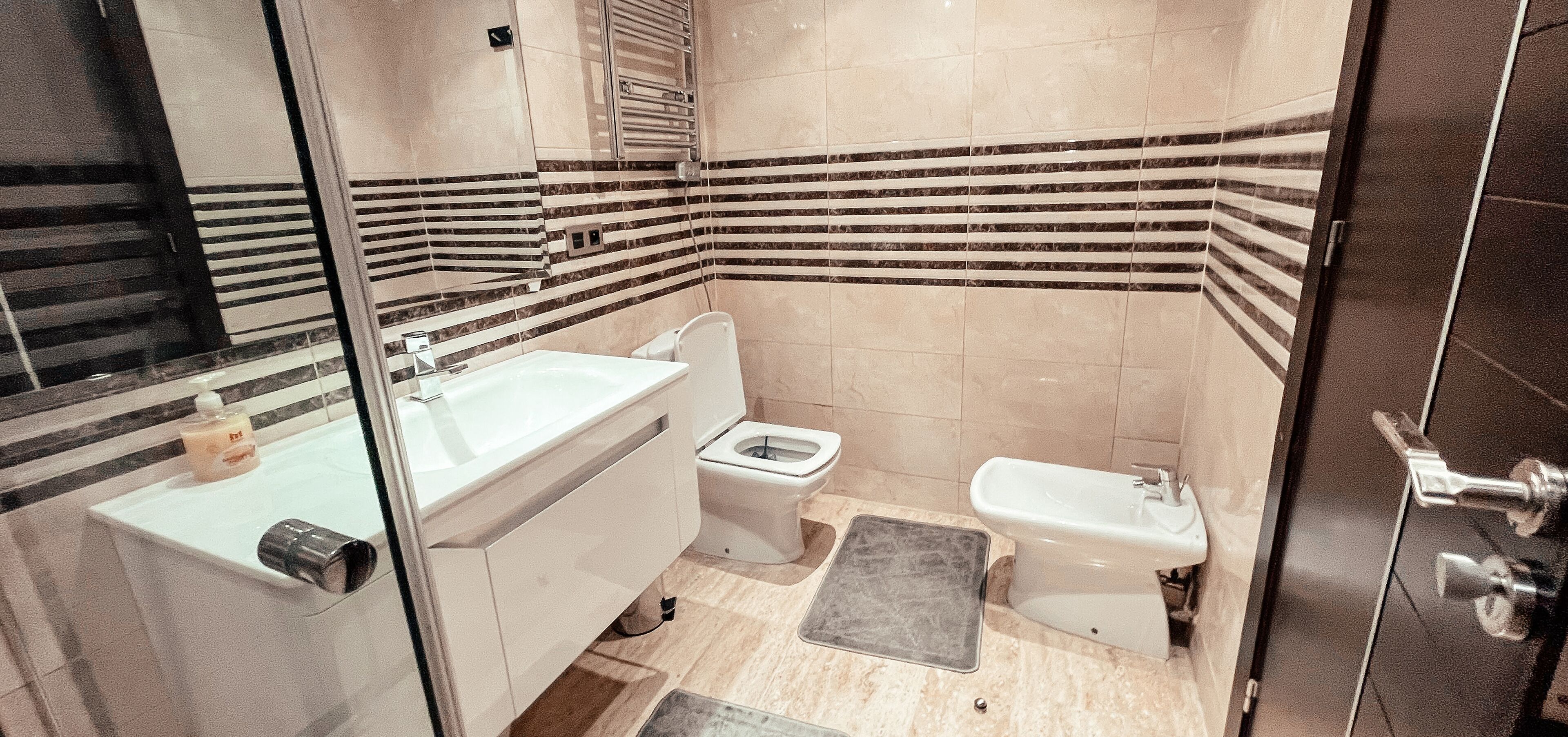 Shower, hair dryer, bathrobes, towels
