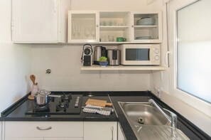 Fridge, microwave, coffee/tea maker, electric kettle