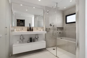 Shower, hair dryer, towels, soap