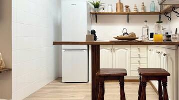 Fridge, microwave, coffee/tea maker, toaster