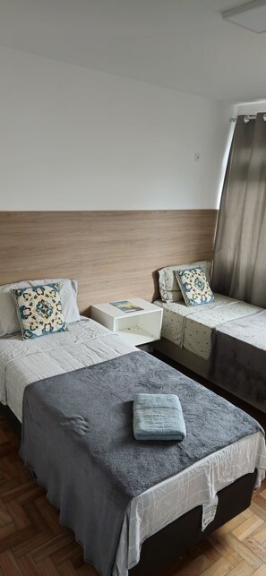 2 chambres, fer et planche à repasser