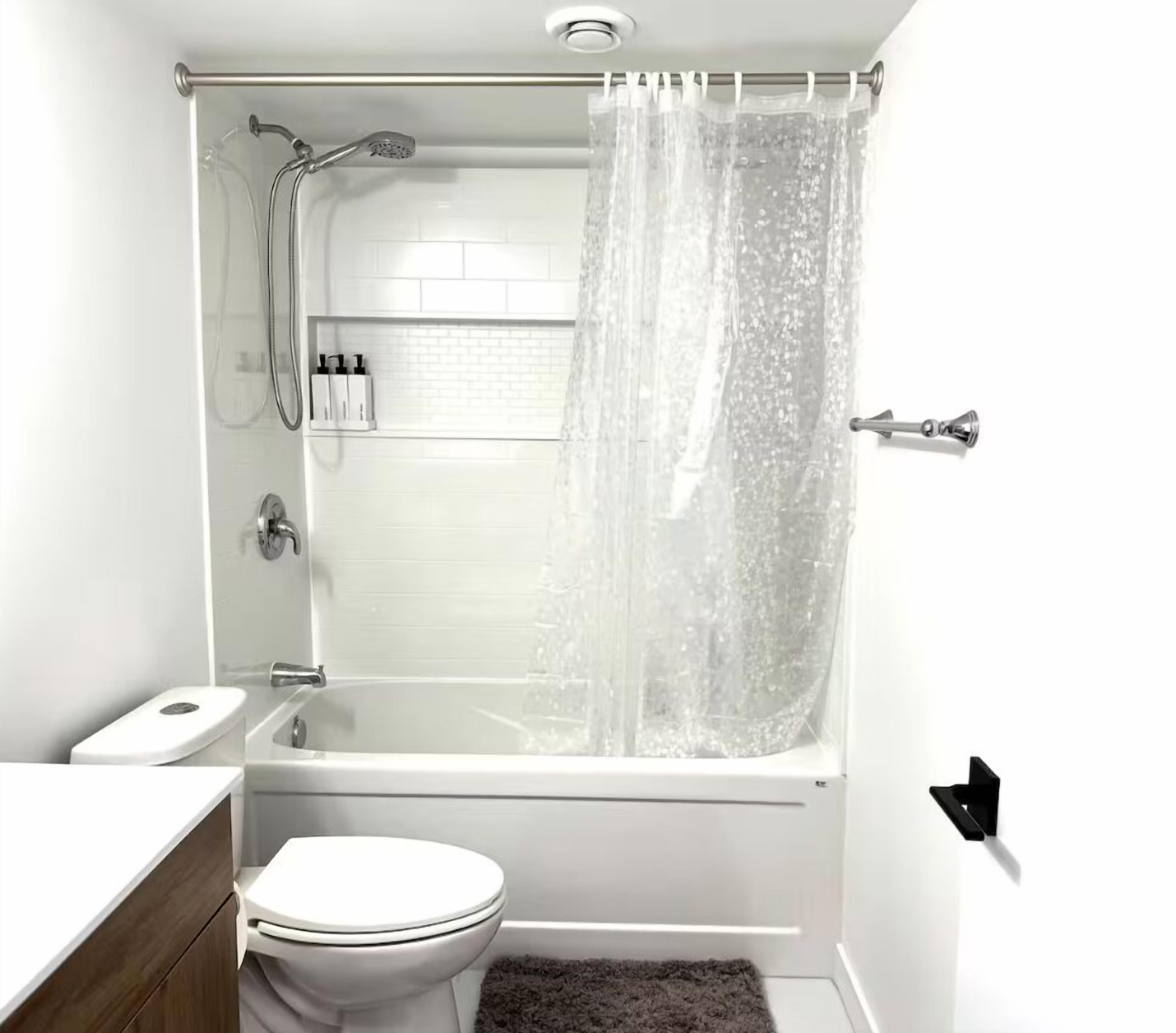 Hair dryer, towels, soap, shampoo
