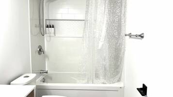 Hair dryer, towels, soap, shampoo