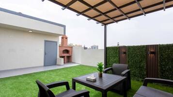 Phòng Suite Junior, sân hiên, quang cảnh vườn | Hiên