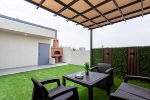 Junior-Suite, Terrasse, Gartenblick | Terrasse/Patio