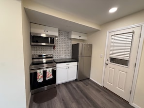 Refrigerador, microondas, horno, placa de cocina