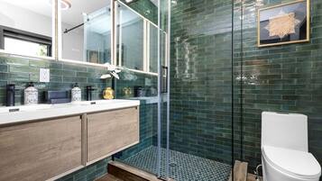 Shower, hair dryer, towels, soap