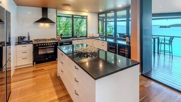 Luxury Apartment, Sea View, Oceanfront | Private kitchen | Highchair