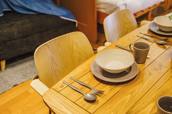 Basic Apartment, City View | Living area | 32-inch flat-screen TV with cable channels