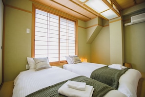Deluxe Apartment, City View | Blackout drapes, iron/ironing board, free WiFi, bed sheets