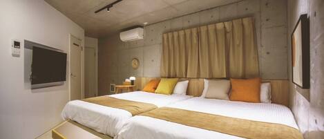 Blackout curtains, soundproofing, free WiFi, bed sheets